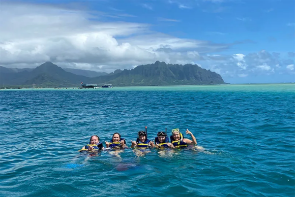 Family snorkeling at Kaneohe Bay