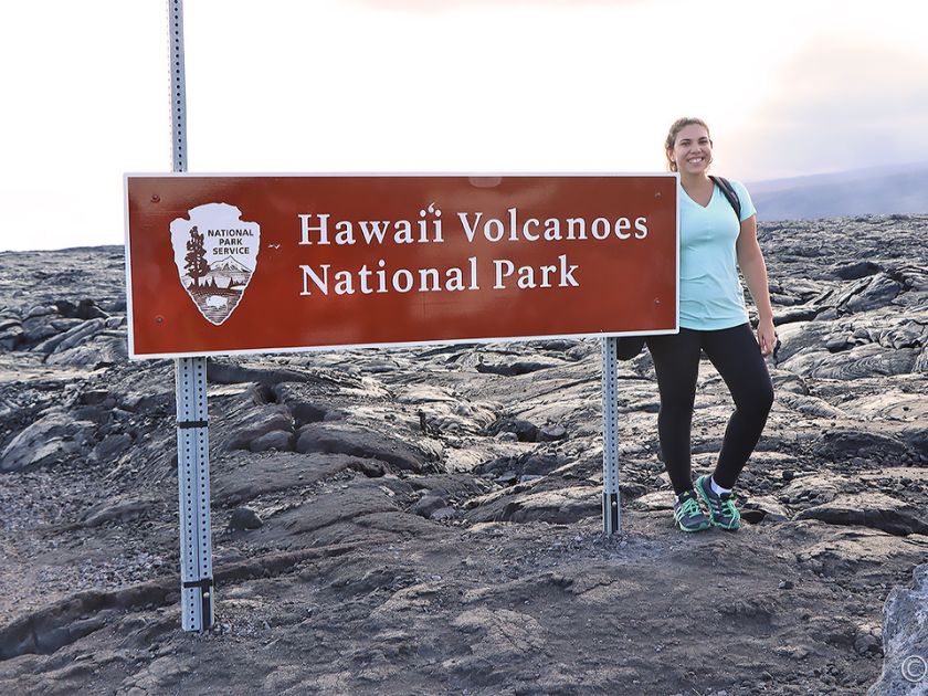 Maira from team Veltra standing beside the HVNP signage