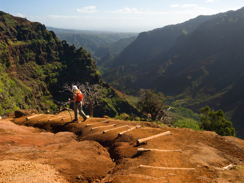 One woman hiking a Waimea Canyon trail, Hawaii.