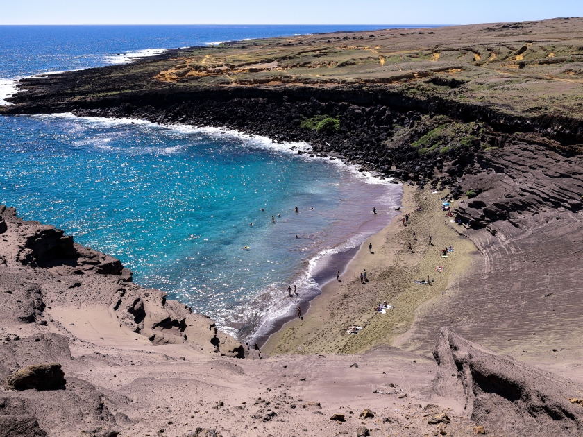 View at Papakōlea Beach - a green sand beach located near South Point, one of four green beaches in the world.