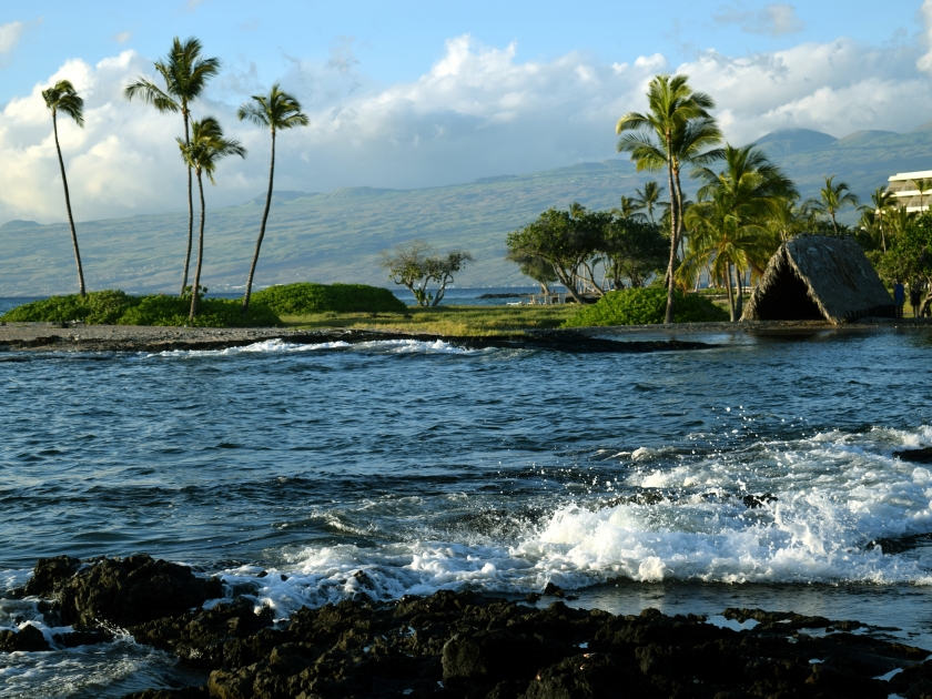 Makaiwa Bay with ancient hawaiian home in the distance, near Mauna Lani resort, on the Kohala coast, Big Island, Hawaii