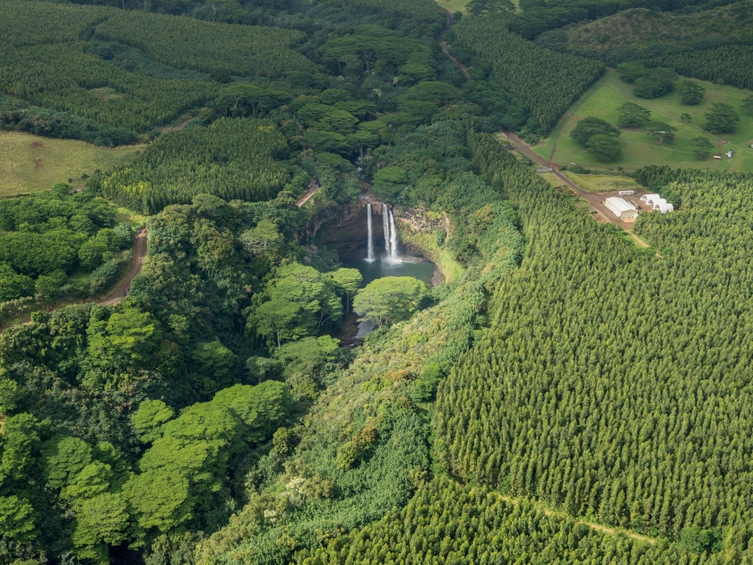 Aerial view of Opaeka'a Falls on hawaiian island of Kauai from helicopter flight
