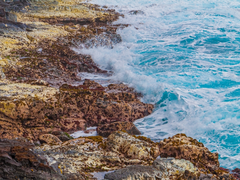 Ocean Waves Crashing Onto The Rocky Shoreline Near Pahoa, Hawaii Island, Hawaii, USA
