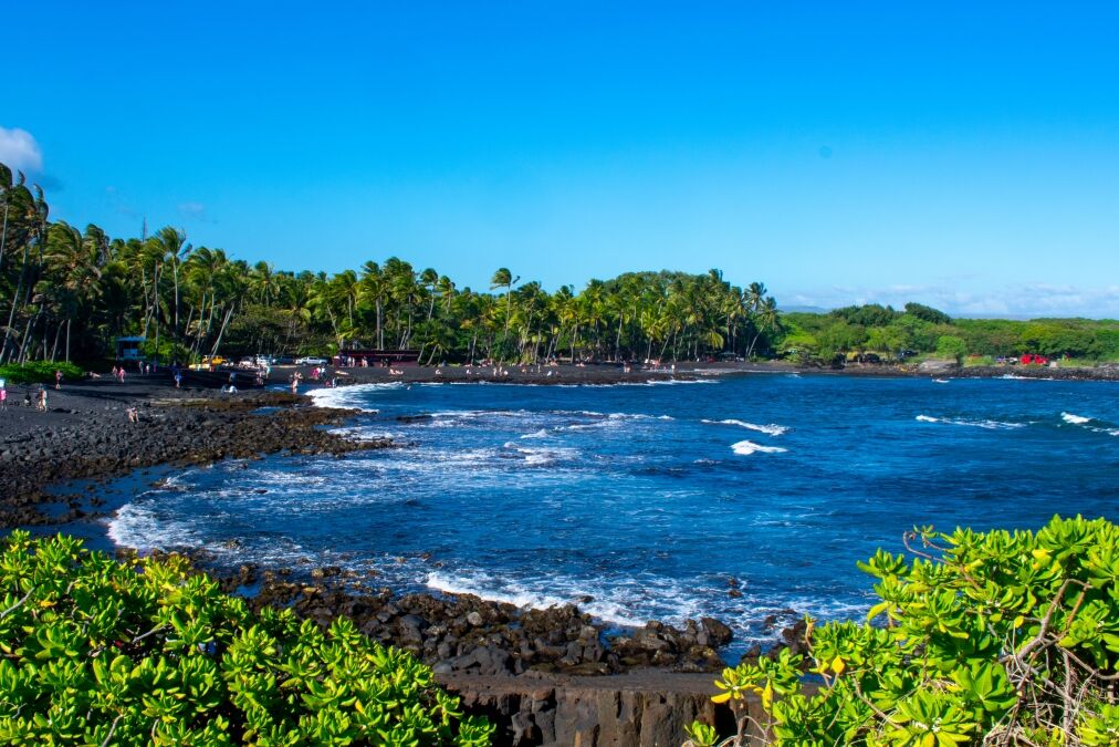 Sunny day at Punalu'u Black Sand Beach on the Big Island. Island of Hawaii, Hawaii, USA.