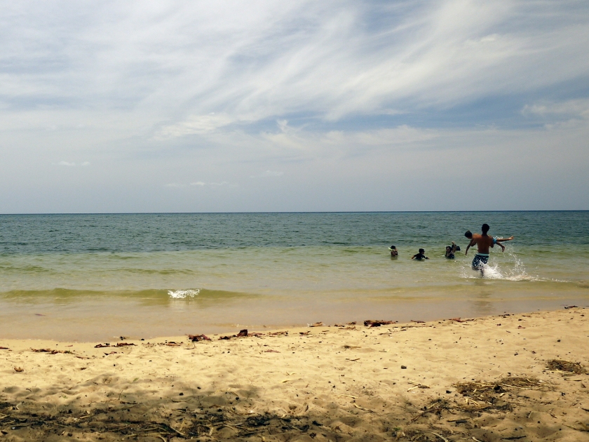 Family fun at Spencer beach on a summer afternoon. Big Island, Hawaii