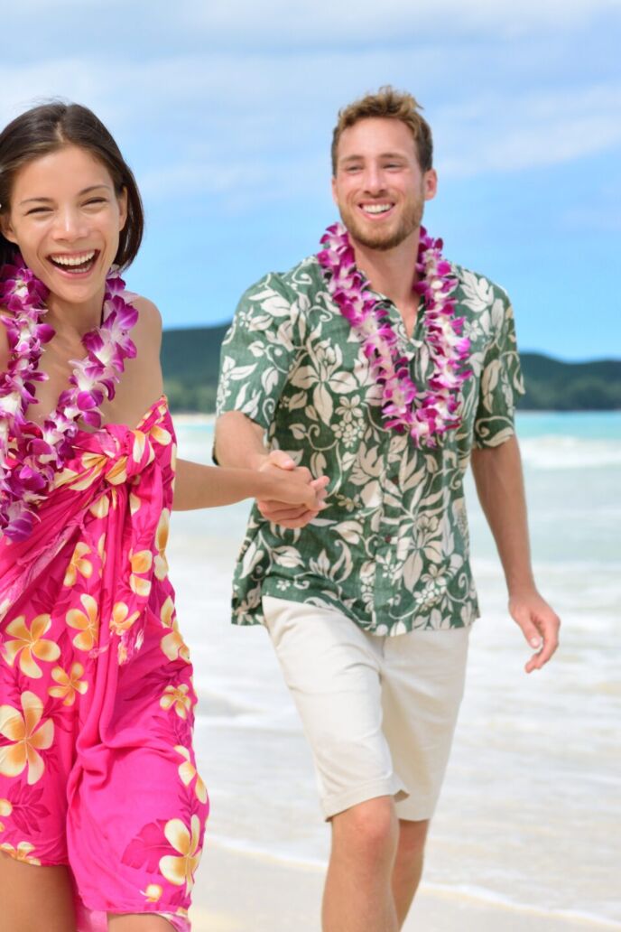 Happy,Couple,Having,Fun,Running,On,Hawaii,Beach,Vacations,In