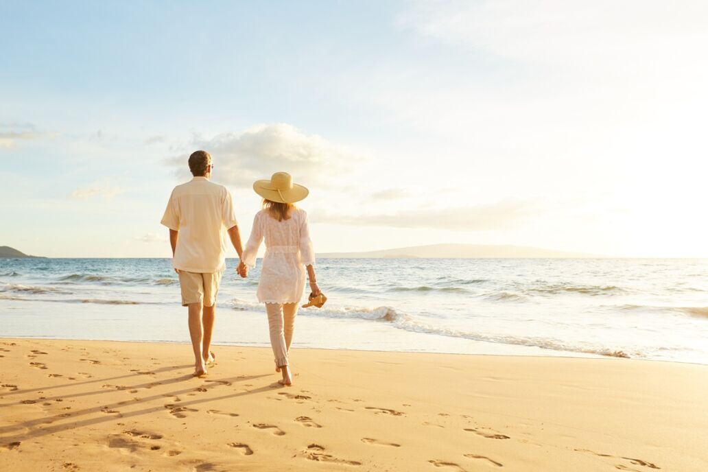 Happy,Romantic,Middle,Aged,Couple,Enjoying,Beautiful,Sunset,Walk,On
