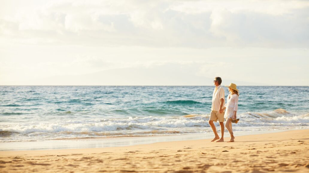 Happy,Romantic,Middle,Aged,Couple,Enjoying,Beautiful,Sunset,Walk,On