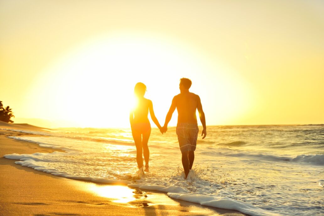 Honeymoon,Romantic,Couple,In,Love,Holding,Hands,Walking,On,Beautiful