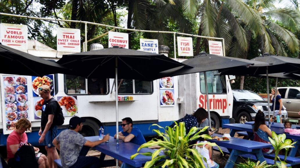 Oahu, Hawaii, United States, May 2nd 2018, people eating at a good truck