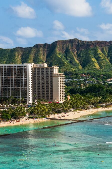 Hawaii panoramic Honolulu city travel landscape banner background of Waikiki beach and Diamond Head mountain peak at sunset, Oahu island, USA vacation.