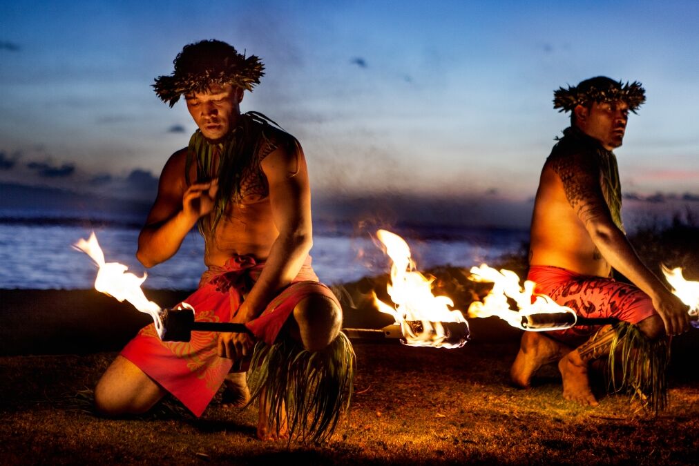 Two Hawaiian Men preparing to Dance with Fire in Maui