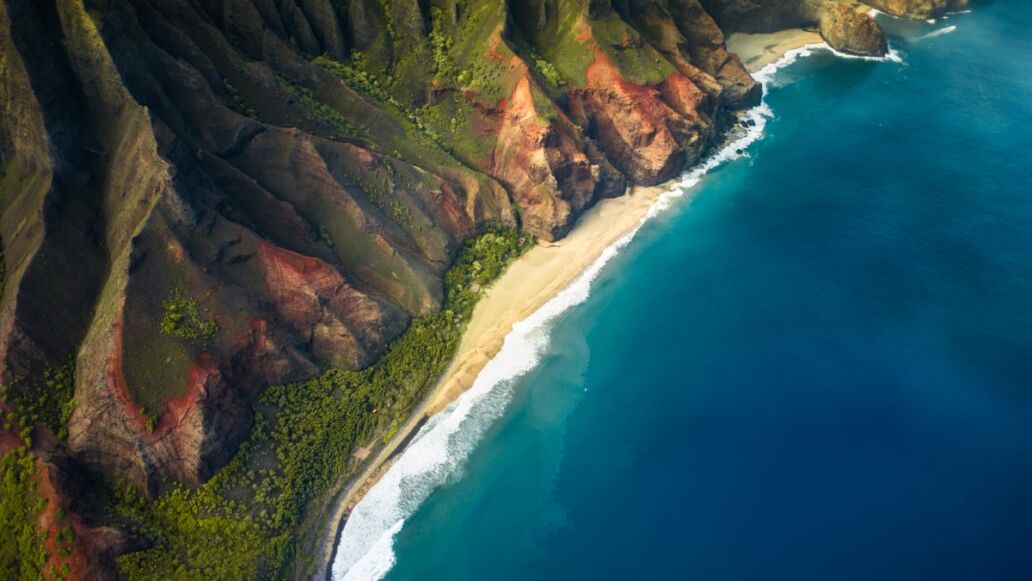 beautiful nature landscape in Kauai island Hawaii. View from helicopter/plane/top. Forest. Mountains. Ocean. View . Drone