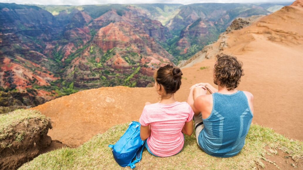 Hawaii,Kauai,Nature,Hiking,Couple,Enjoying,View,Of,Waimea,Canyon.happy