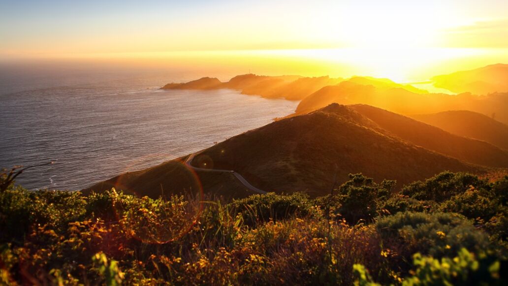Dramatic,Coastal,Sunset,With,Island,Peninsula,And,Golden,Light,Ocean