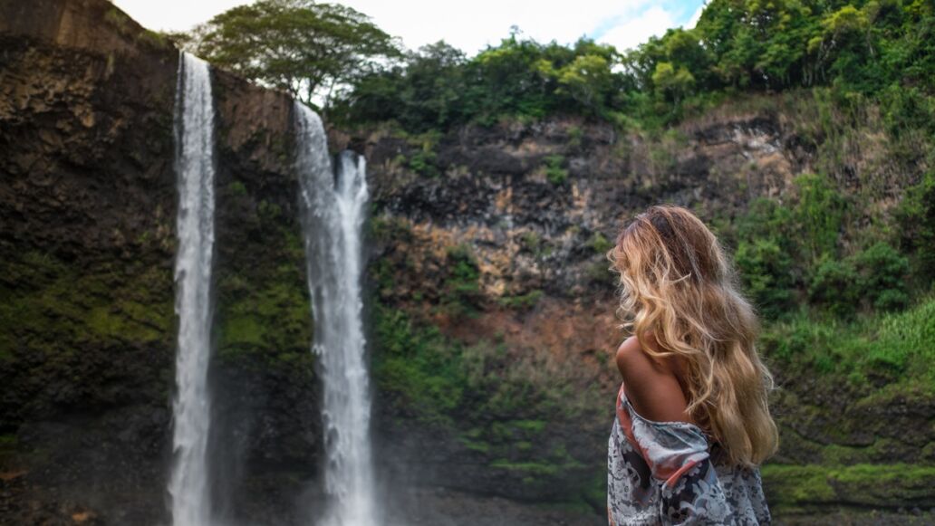 Beautiful,Waterfall,In,Kauai,Hawaii,,Back,Of,Sexy,Woman.,Woman