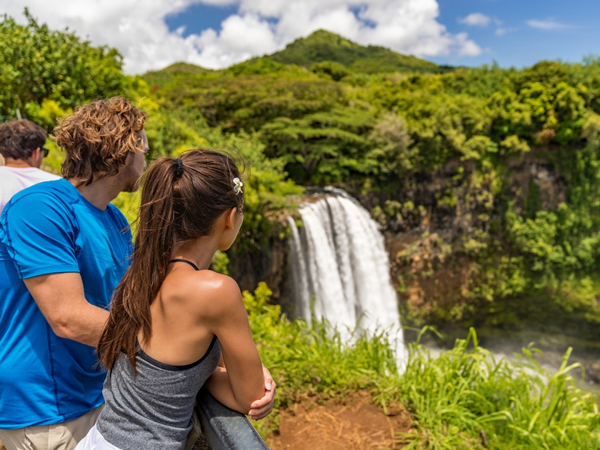 Couple,Tourists,At,Hawaii,Kauai,Waterfall.,Tourist,Visiting,The,Wailua