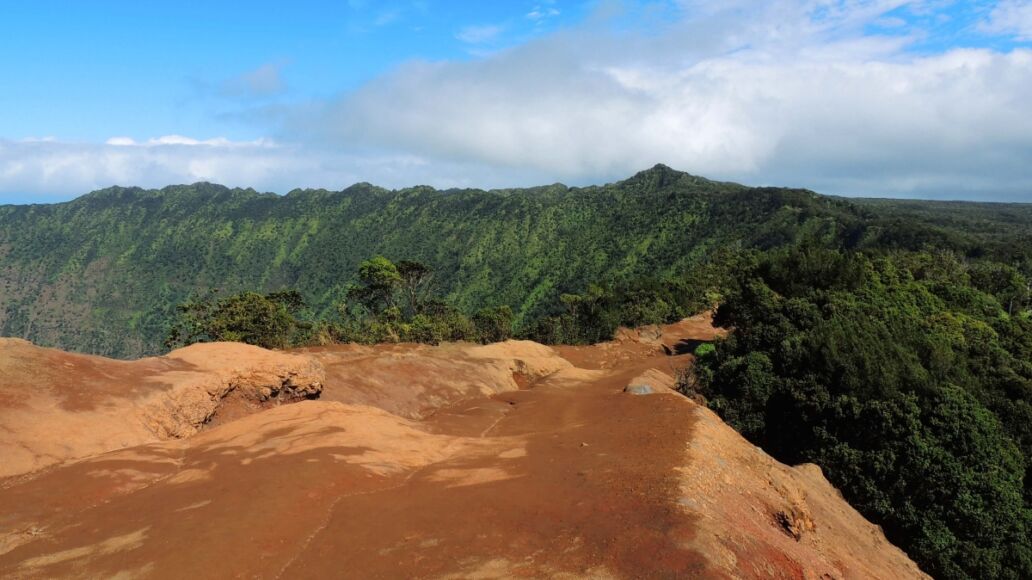 view of pihea peak and the start of the pihea trail hike from the kalalau valley overlook in kauai, hawaii