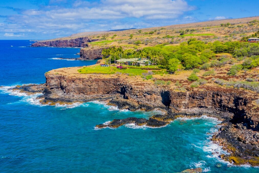 Aerial view of Lanai, Hawaii looking west towards Golf Course, bordering the Pacific Ocean