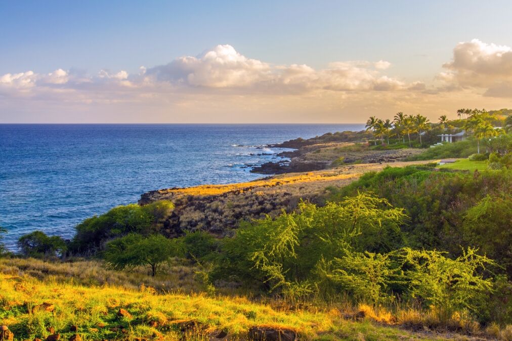 Aerial view of Lanai, Hawaii at sunset. Lanai, a short ferry ride from Lahaina, Maui, is colloquially known as the Pineapple Island because of its past as a pineapple plantation.