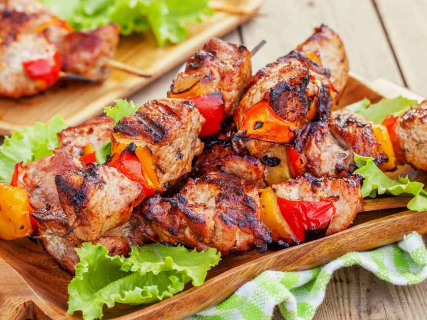 Grilled pork kebab with red and yellow pepper