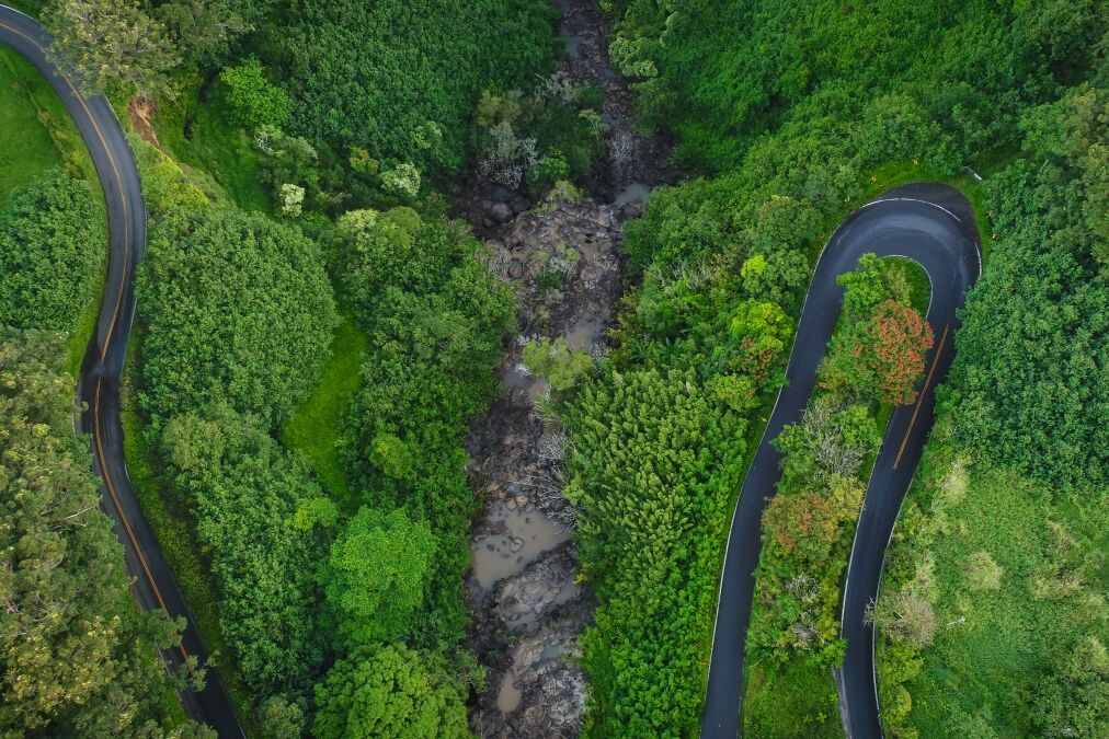 An aerial drone view of Hana Highway on the Road to Hana in Maui, Hawaii.