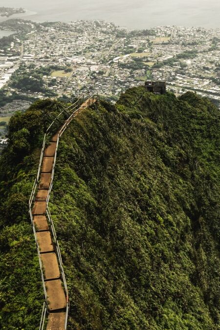 Dramatic moody view of Kaneohe and Ho'omaluhia Botanical Gardenin Oahu, Hawaii.Taken on the Stairway to Heaven (Haiku Stairs) hike.