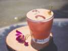Mai Tai drink on beach bar. Close up of alcoholic drink. Vintage tone.