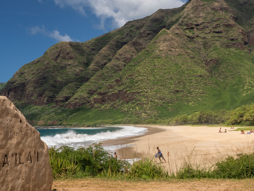 Large waves crash on the shoreline of Kula'ila'i bay and beach on the extreme west coast of Oahu in Hawaii