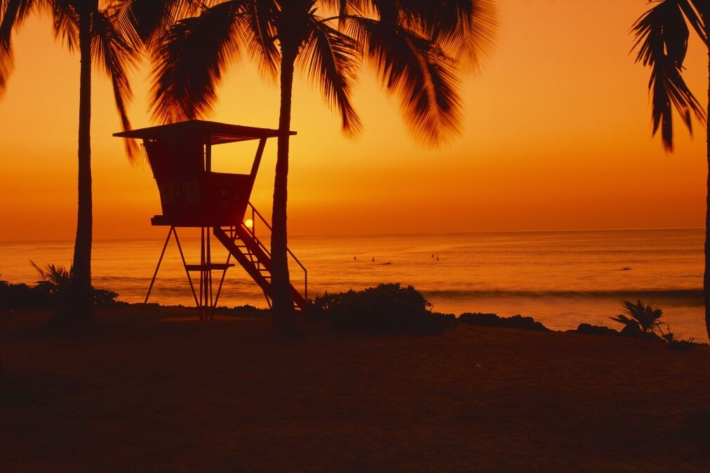 Sunset on lifeguard tower at Wailua Bay, North Shore, Oahu, Hawaii
