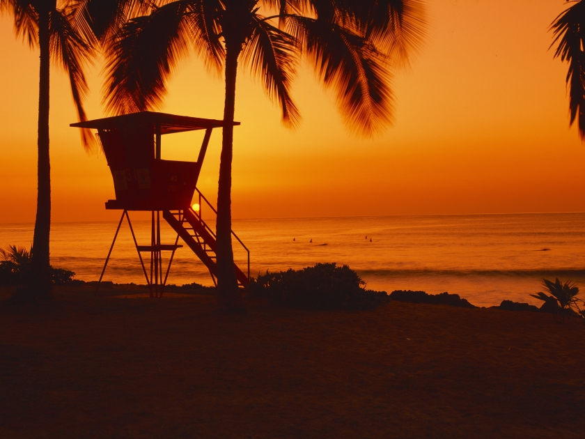 Sunset on lifeguard tower at Wailua Bay, North Shore, Oahu, Hawaii