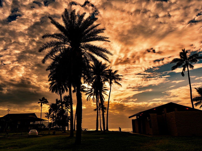 Beautiful sunset and paradise beach, nice silhouettes At Alii Beach Park in Haleiwa town at the Northshore of Oahu island, Hawaii USA
