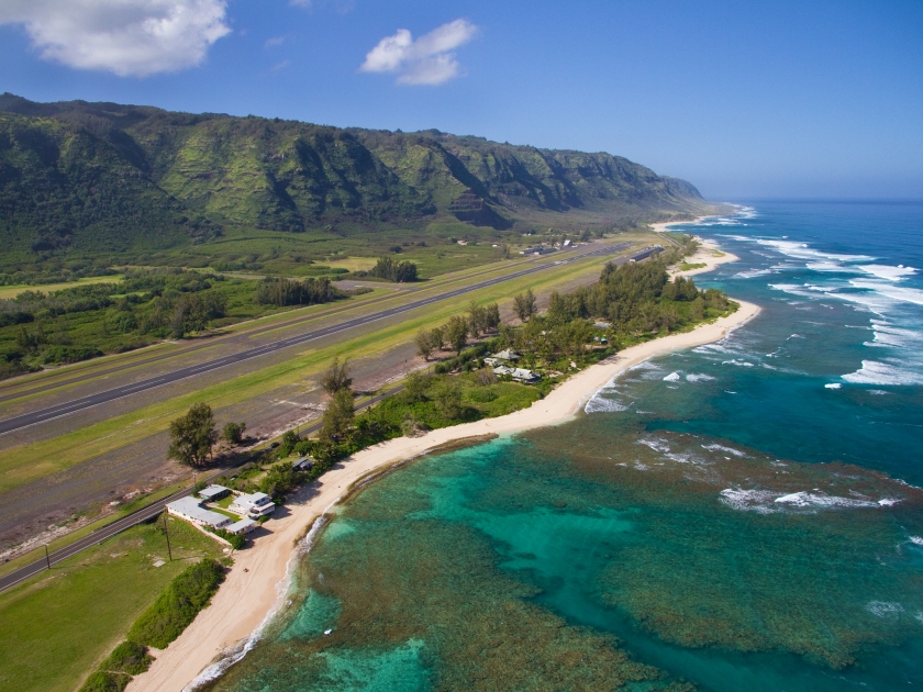 North Shore aerial of Oahu, Hawaii - near Dillingham Airfield - Makuleia Beach in foreground, Hidden Beach and Kaena Point in distance