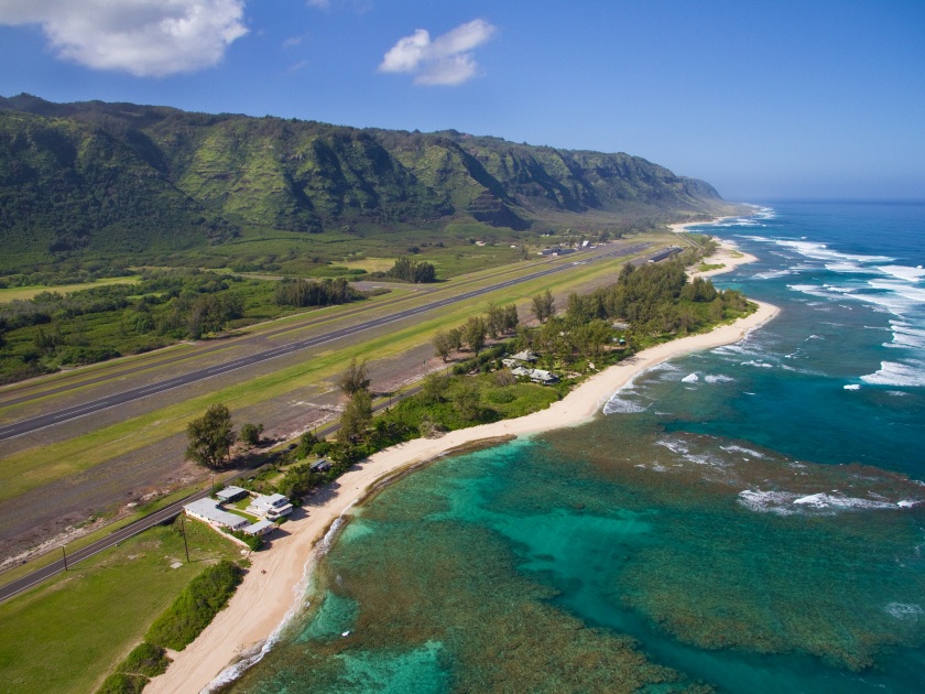 North Shore aerial of Oahu, Hawaii - near Dillingham Airfield - Makuleia Beach in foreground, Hidden Beach and Kaena Point in distance