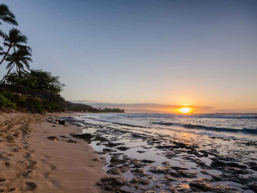 Sunset Beach Oahu, Hawaii Sunset with Palm Trees and Rocks
