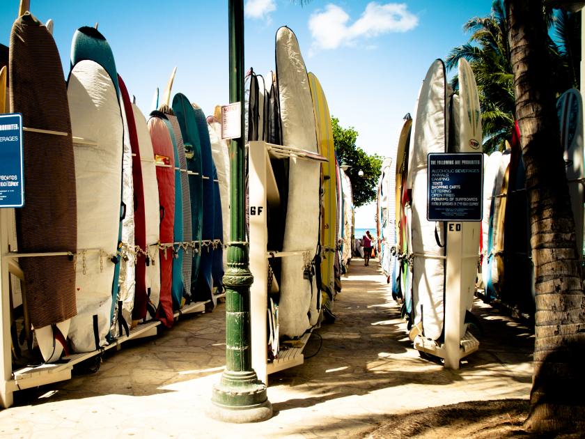 Colorful hawaiian surf boards parking rack in waikiki