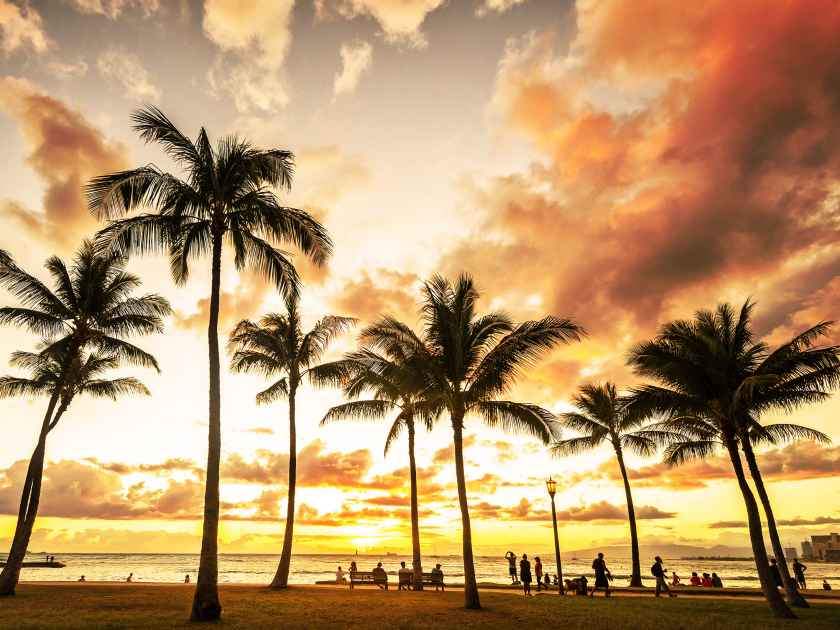 Typical picturesque sunset along Waikiki Beach at golden hour