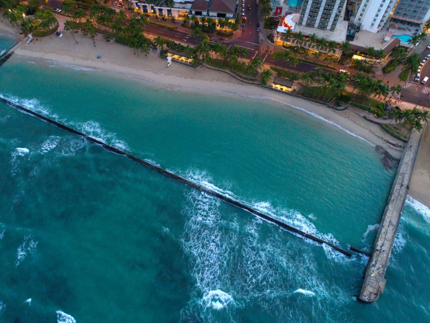 Waikiki Wall blocking waves on the beach Honolulu Hawaii