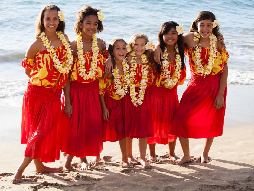 Group of six polynesian Hula girls in Friendship looking at camera