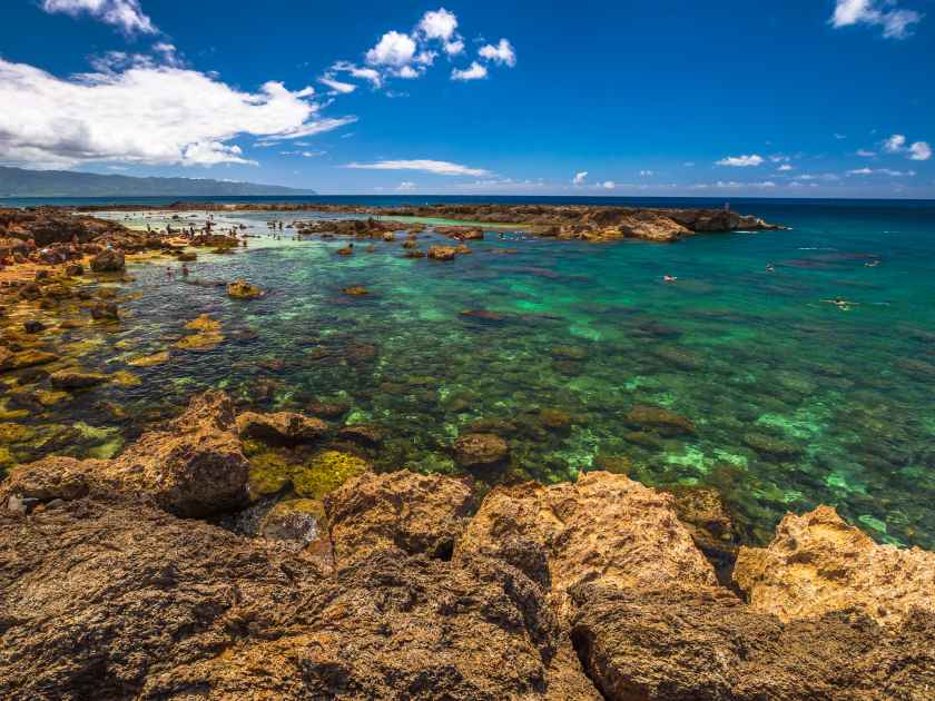 Scenic view of Sharks Cove, Hawaii, a small rocky bay side of Pupukea Beach Park. Sharks Cove is the second best snorkeling site on Oahu in North Shore, and boasts an impressive amount of sea life.