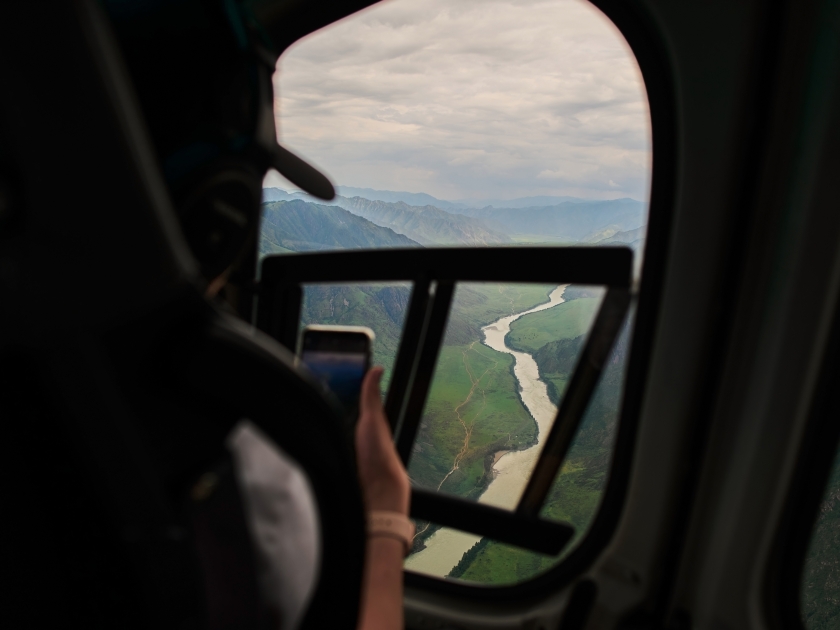 helicopter ride in drmatic deep canyon in the shade.