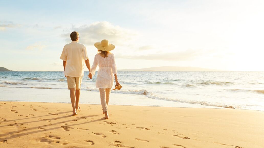 Happy,Romantic,Middle,Aged,Couple,Enjoying,Beautiful,Sunset,Walk,On