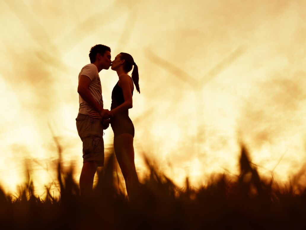 Young,Couple,Kissing,Outdoor