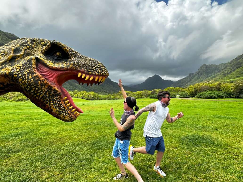 Visitors enjoying the Jurassic Park film spot at Kualoa Ranch