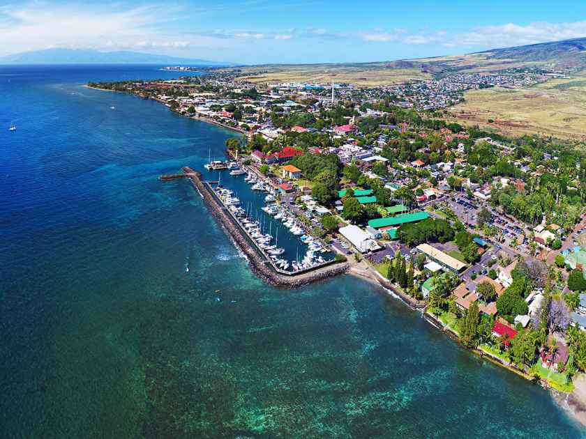 An aerial shot of Lahaina showing the harbor