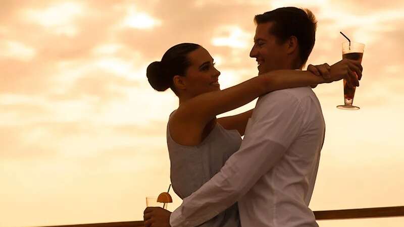 Couple enjoying a dinner cruise in Oahu