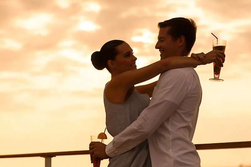 Couple enjoying a dinner cruise in Oahu