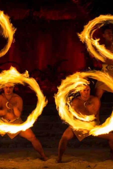 See a night show with fire knife dancing