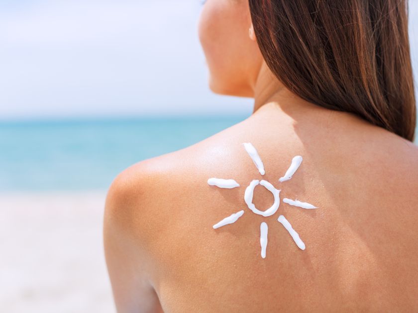 Sunscreen on a woman's shoulder