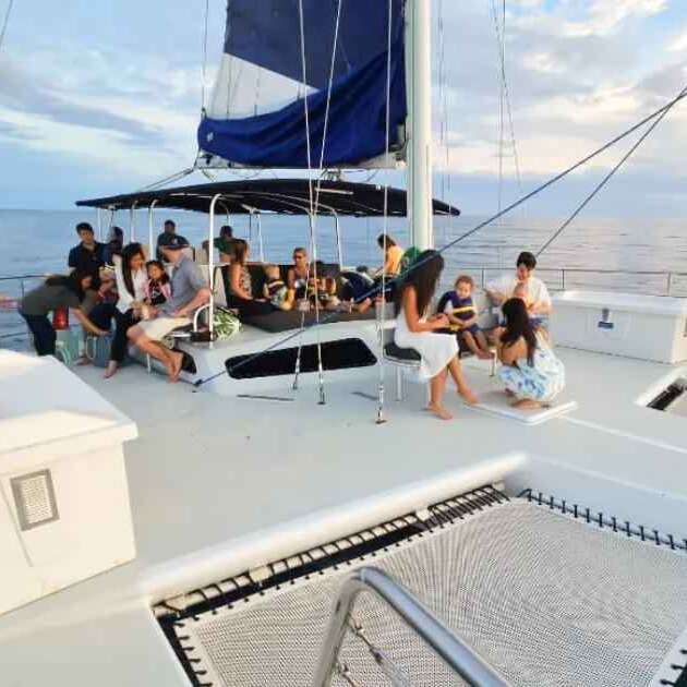 Sunset Cruise Honolulu Swim & Sail Tour - Three Tiki Catamaran